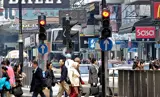 Picture of a crowded Chinese street.