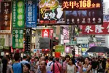 People walking in street in China